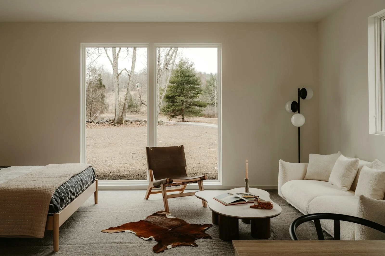 A peaceful sitting room with a wide picture window